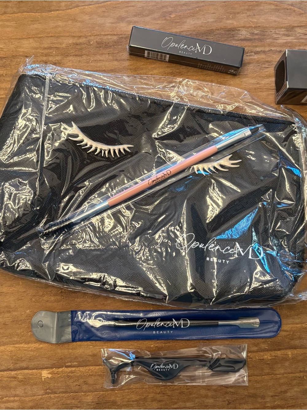 Black Cosmetic Pouch with Pink Dual-Ended Brush